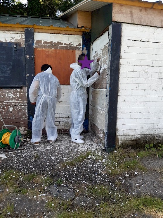 Two young men, who wanted to develop employment skills, helped revamp a run down room at the local local cricket club